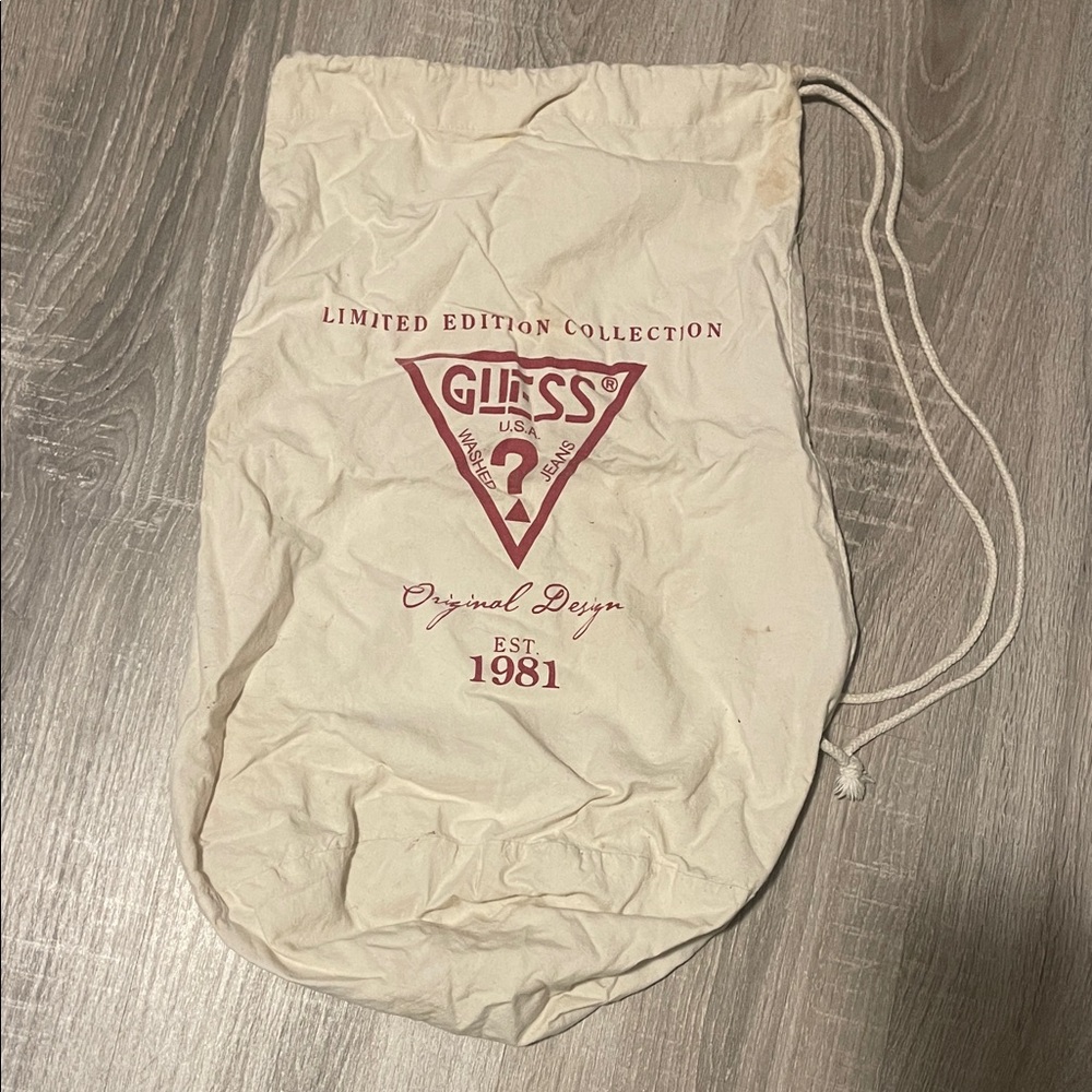 Guess Cream Drawstring Bag with Red Logo